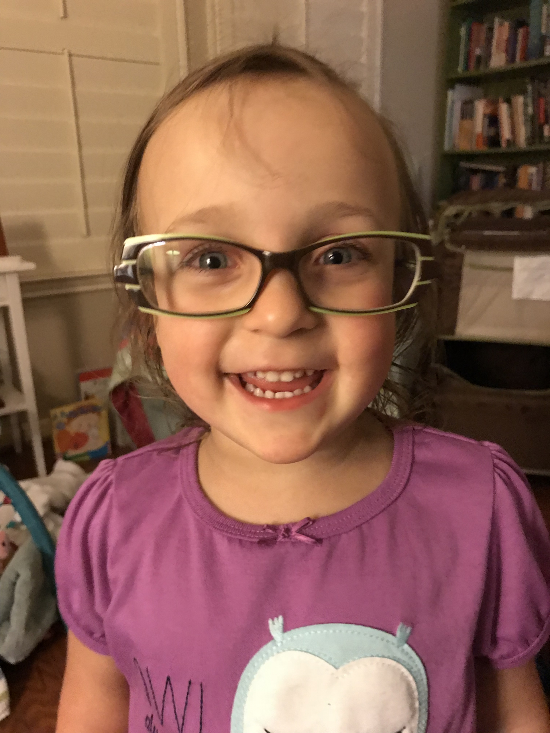 Ellie wearing Gika’s glasses