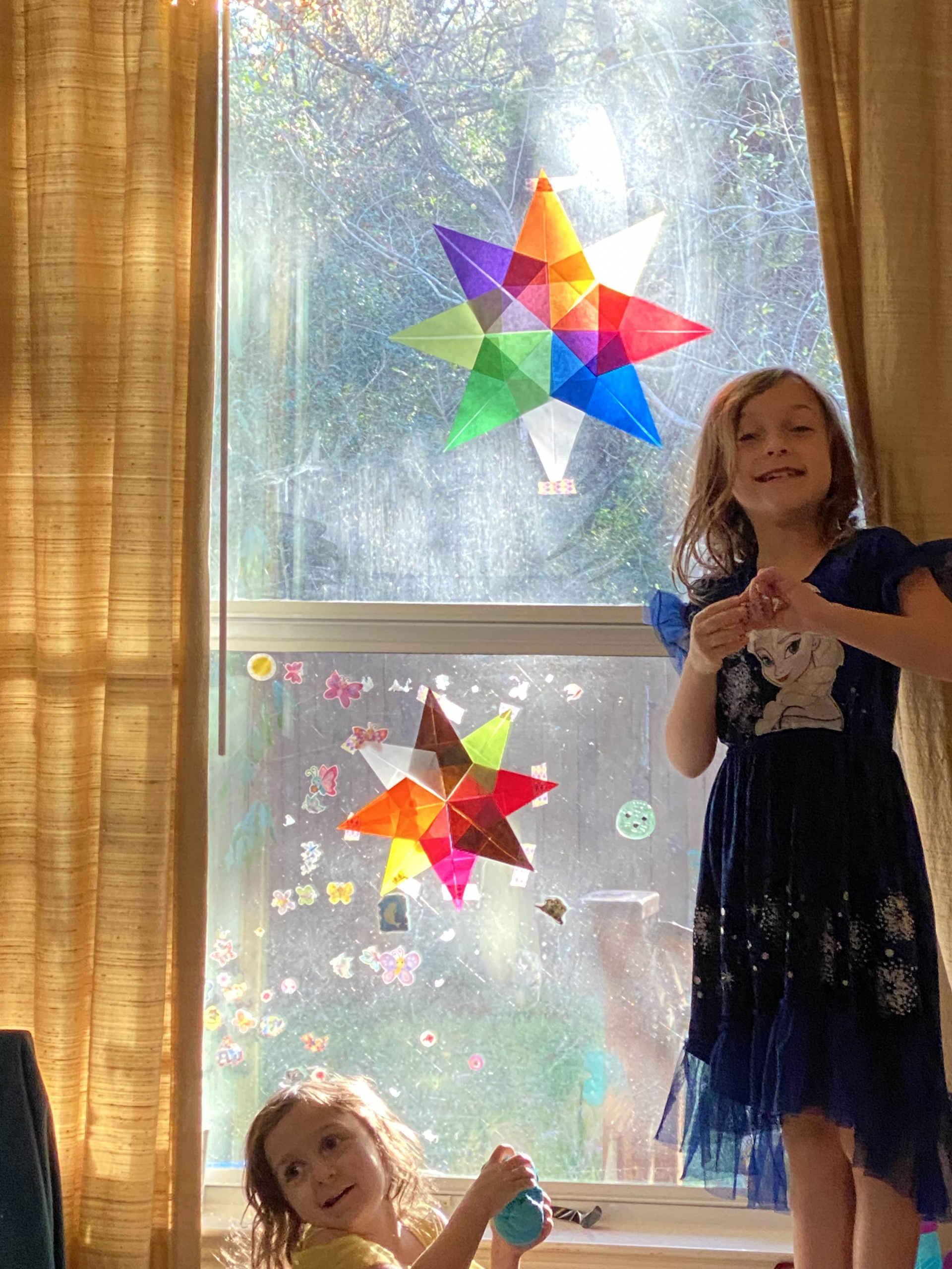 Little girls and window stars