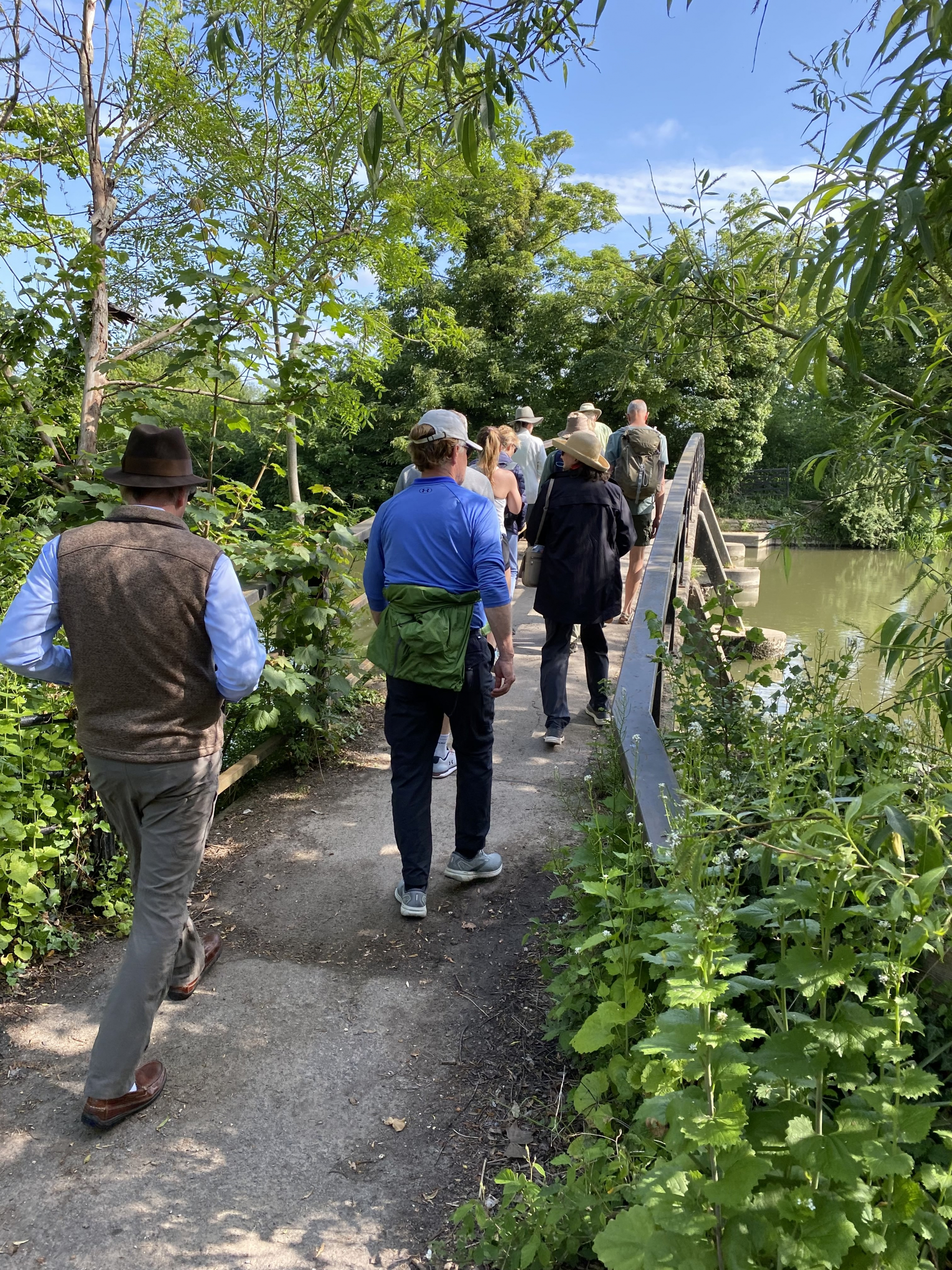 People walking across a bridge