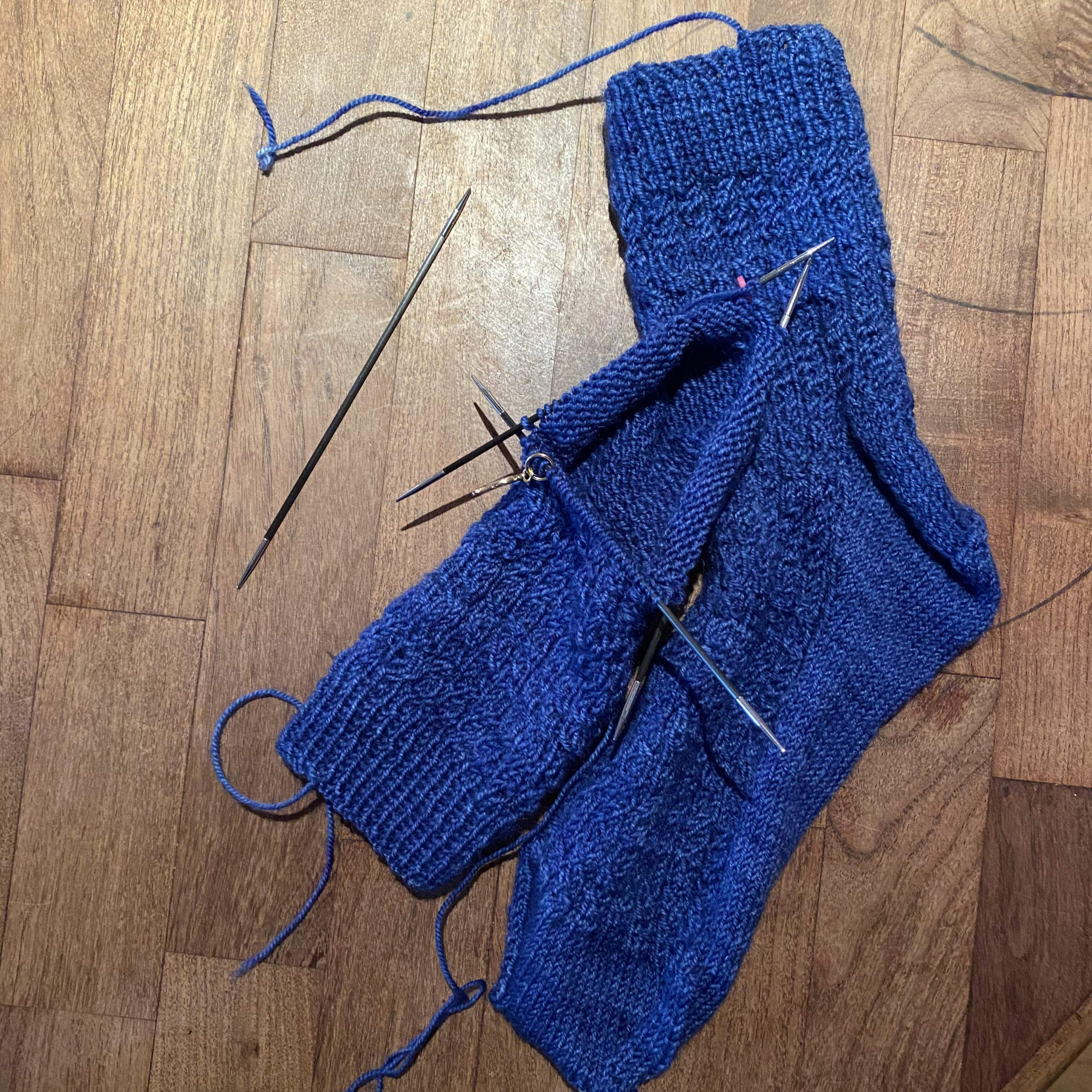 Blue Hand-knit socks in process